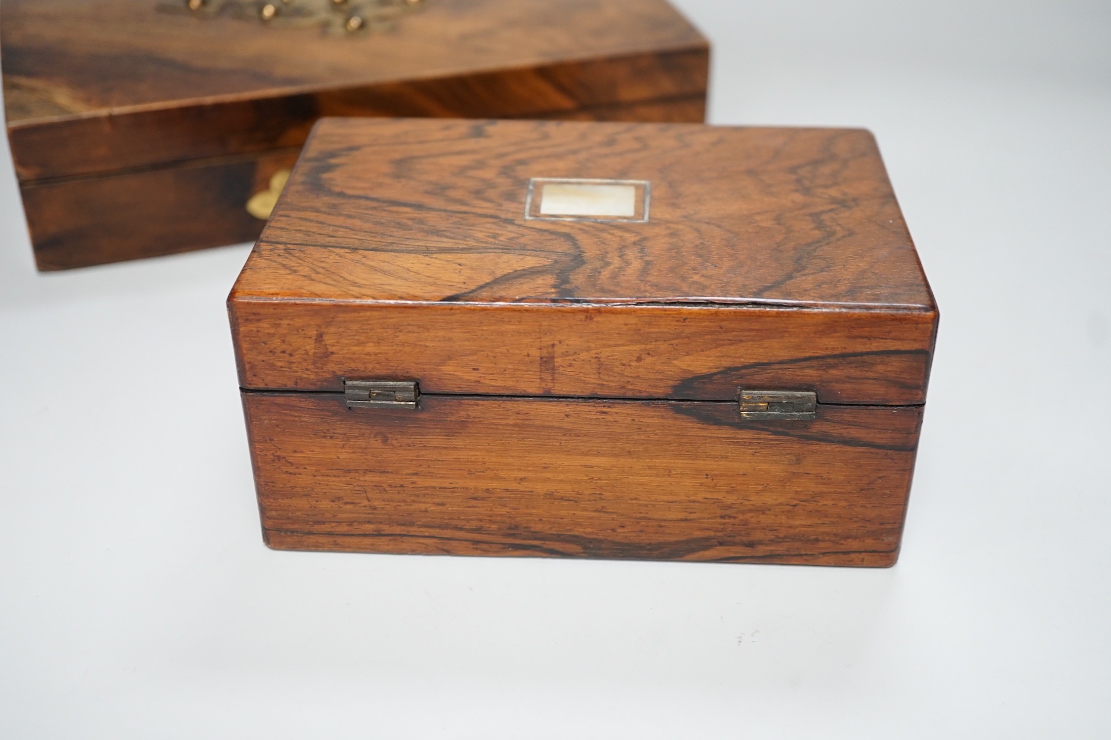A Victorian walnut and brass 'Bezique' games box and a rosewood box. Largest 23cm wide